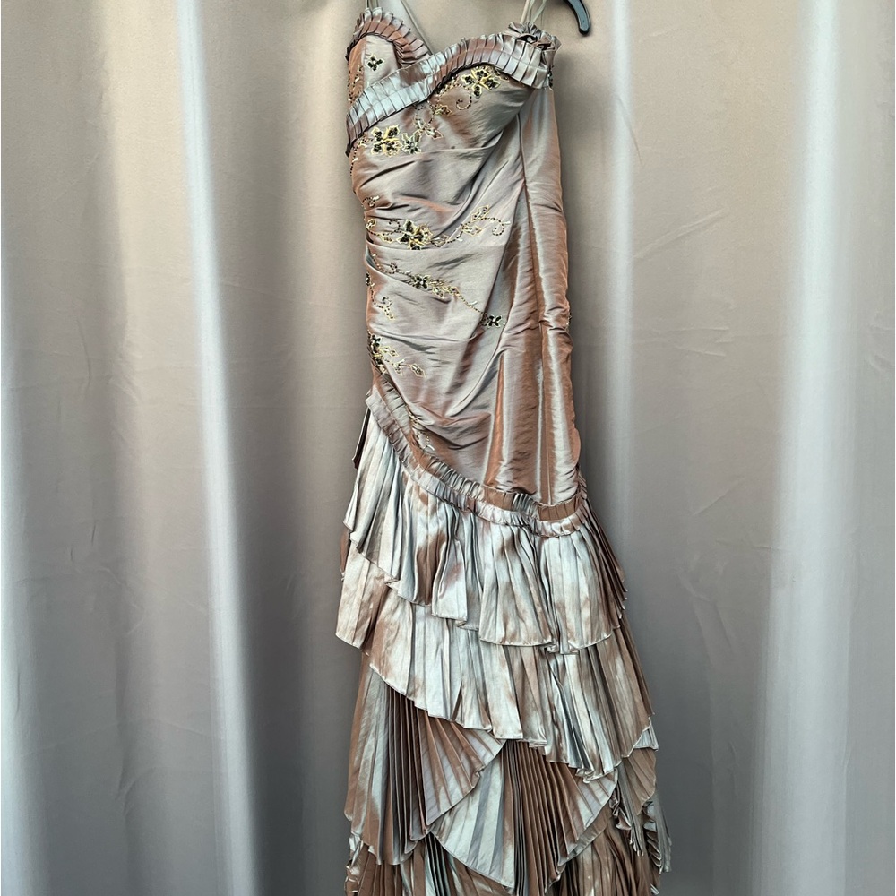 Gown with beaded work and ruffle designing